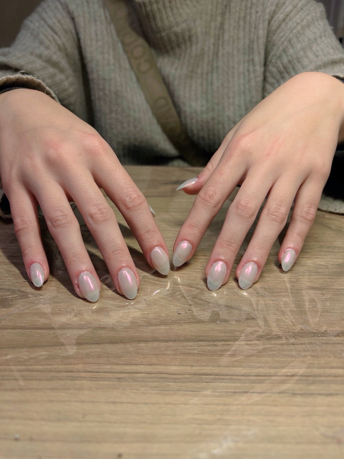 Pearlescent chrome almond nails
